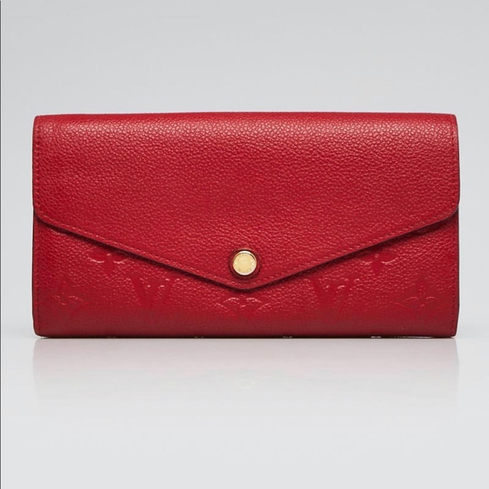 Authentic Louis Vuitton Sarah Wallet in Cerise color